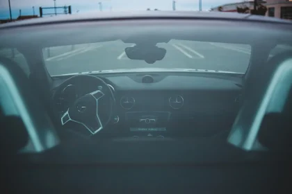 How will self-driving cars challenge our current society?