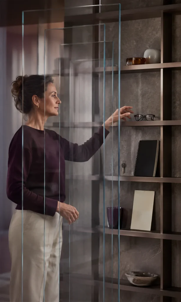 Person looking at clearly visible files through several transparent layers, representing delayed processing rather than lost memory