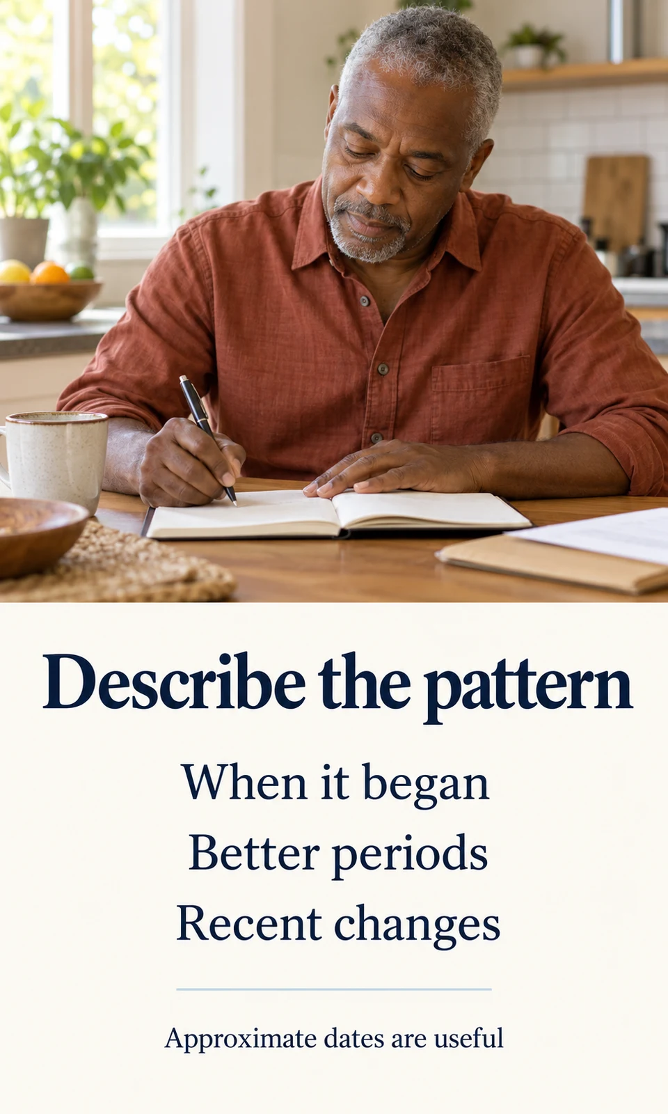 Man writing notes about when low mood began, better periods, and recent changes.