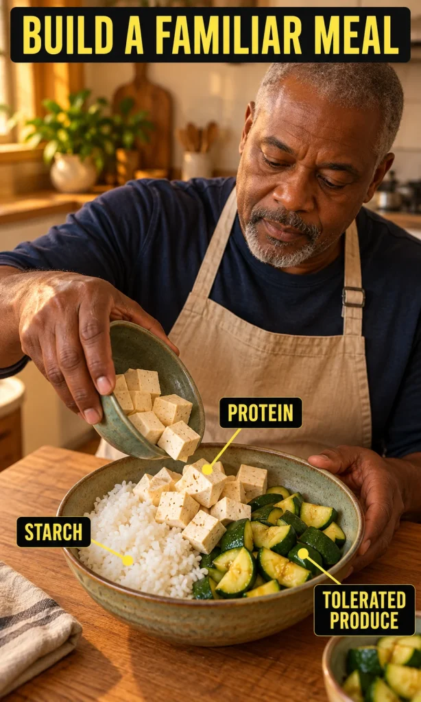 Cook adding tofu to soft white rice with peeled cooked zucchini in a bowl.